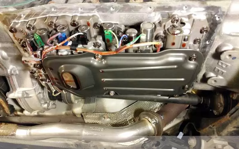 change-the-transmission-fil Car Shaking When Braking at High Speeds (13 Causes & Solutions)