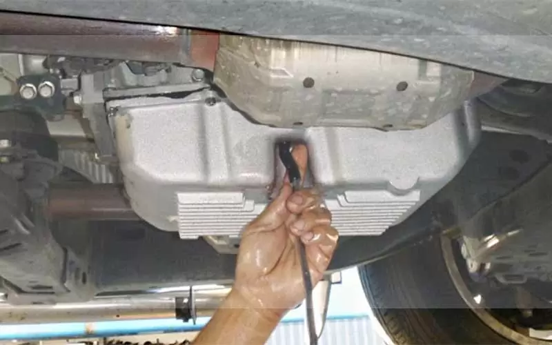 fixing-the-transmission-fluid Transmission Fluid Leak When Parked Causes and Easy Solutions