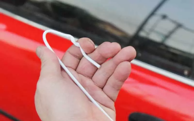 Bend-the-hook-into-V-shape How to Unlock a Car with a Coat Hanger - Complete Process