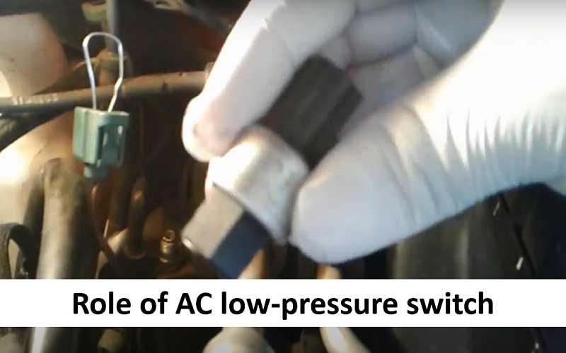 What does an AC low-pressure switch do